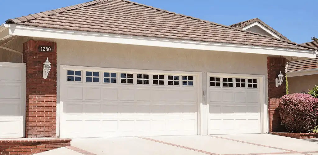 Residential garage door repair service for a double garage door in Salt Lake City, UT