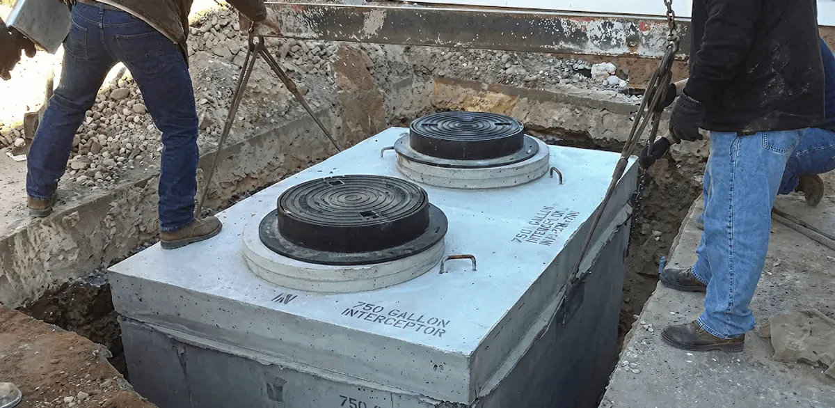 Grease trap installation for a commercial property drainage system in Salt Lake City, UT