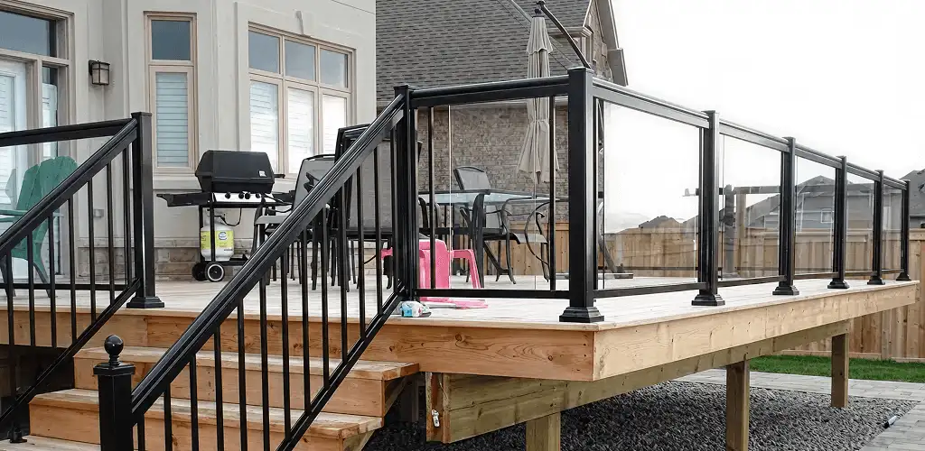 Handrail installation on a deck staircase for safety and code compliance in Salt Lake City, UT